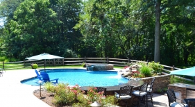 Freeform pool and spa with landscaping