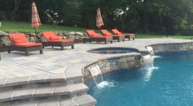 Raised Spa and Patio with Sheer Descents
