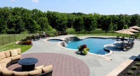 Custom Free Form Pool with Spa and Raised Rock Wall