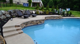 Custom Pool with Raised Rock Wall