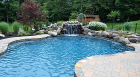 Freeform pool with grotto waterfalls