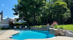 Pool with boulder landscaping