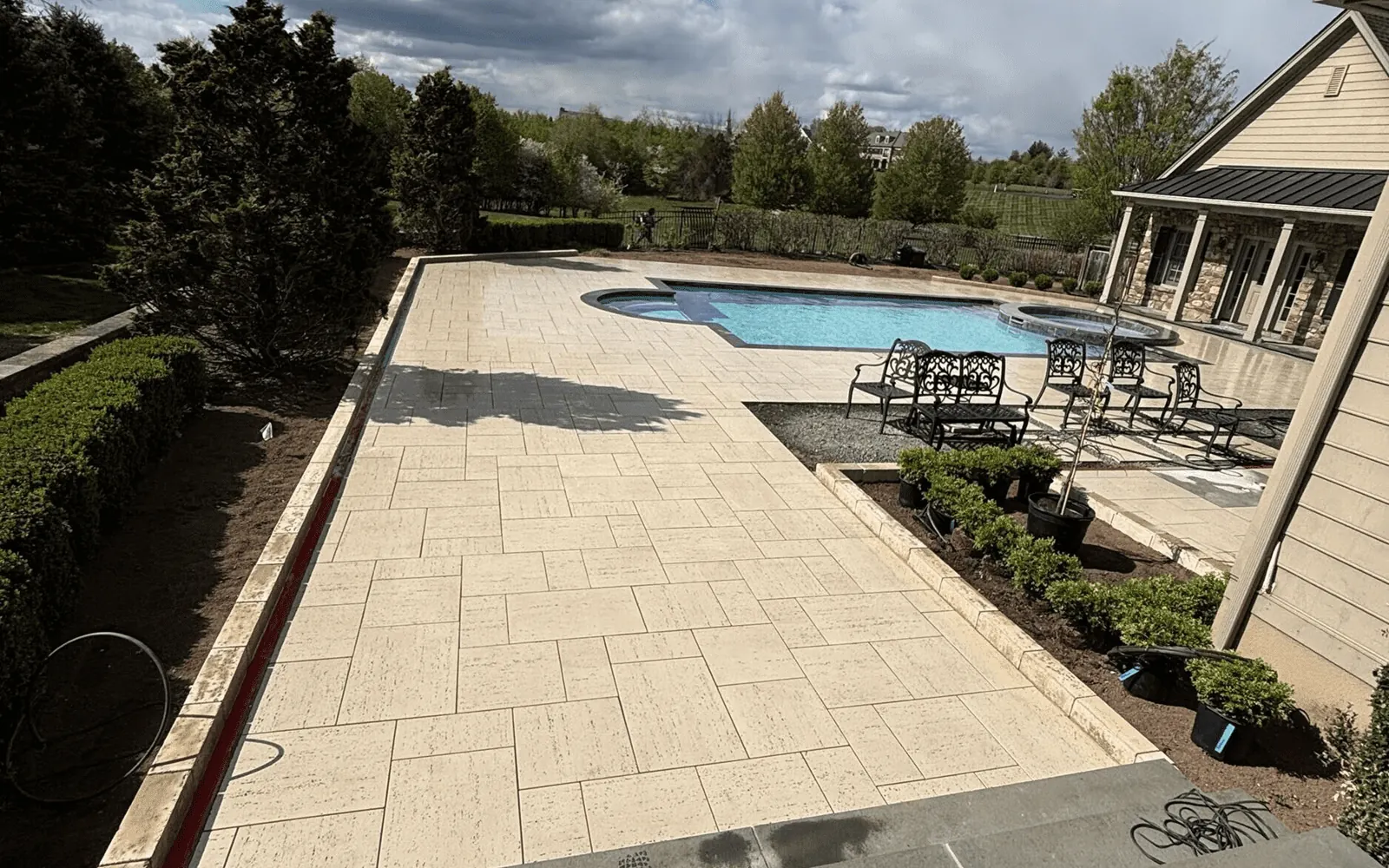 Renovated pool and outdoor living space in Collegeville, Pennsylvania by Blue Tree Outdoor Living