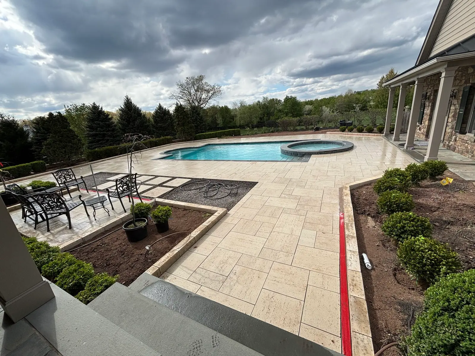 Finished pool, spa, and large-format patio in Collegeville, PA