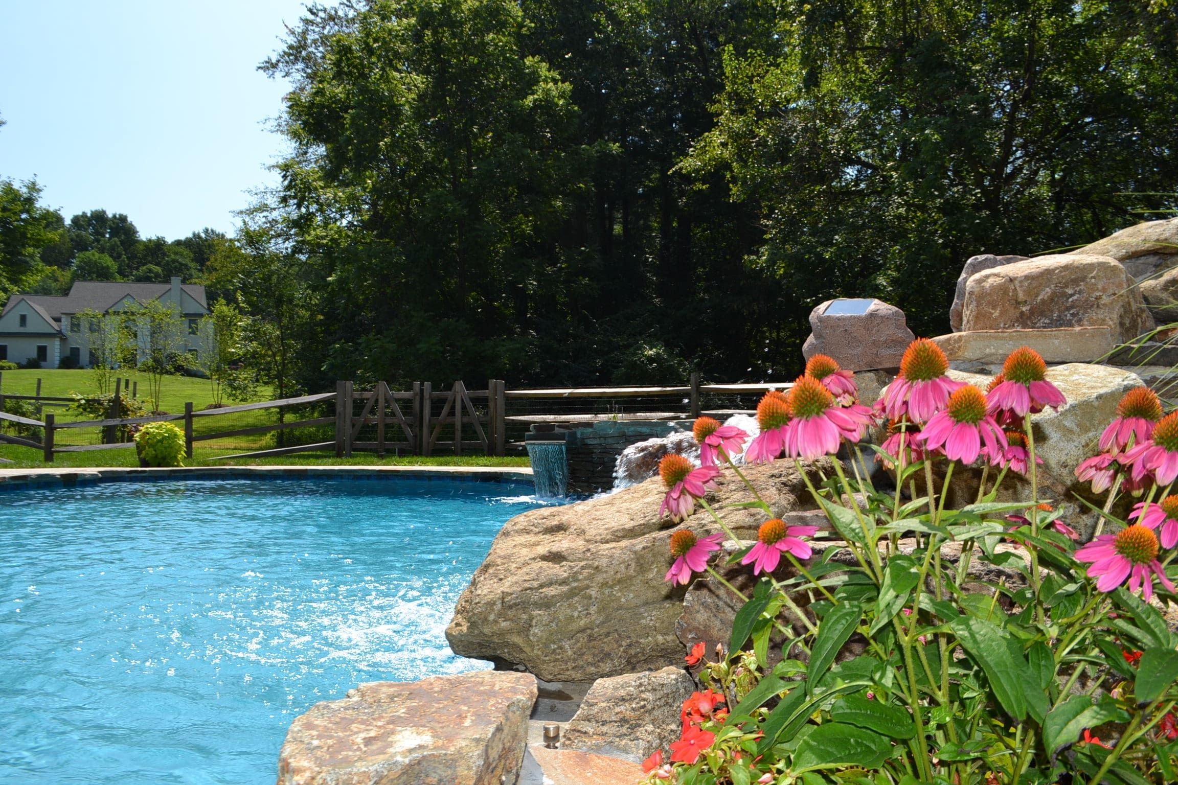 Resort-style backyard with custom pool and outdoor kitchen in Phoenixville, Pennsylvania