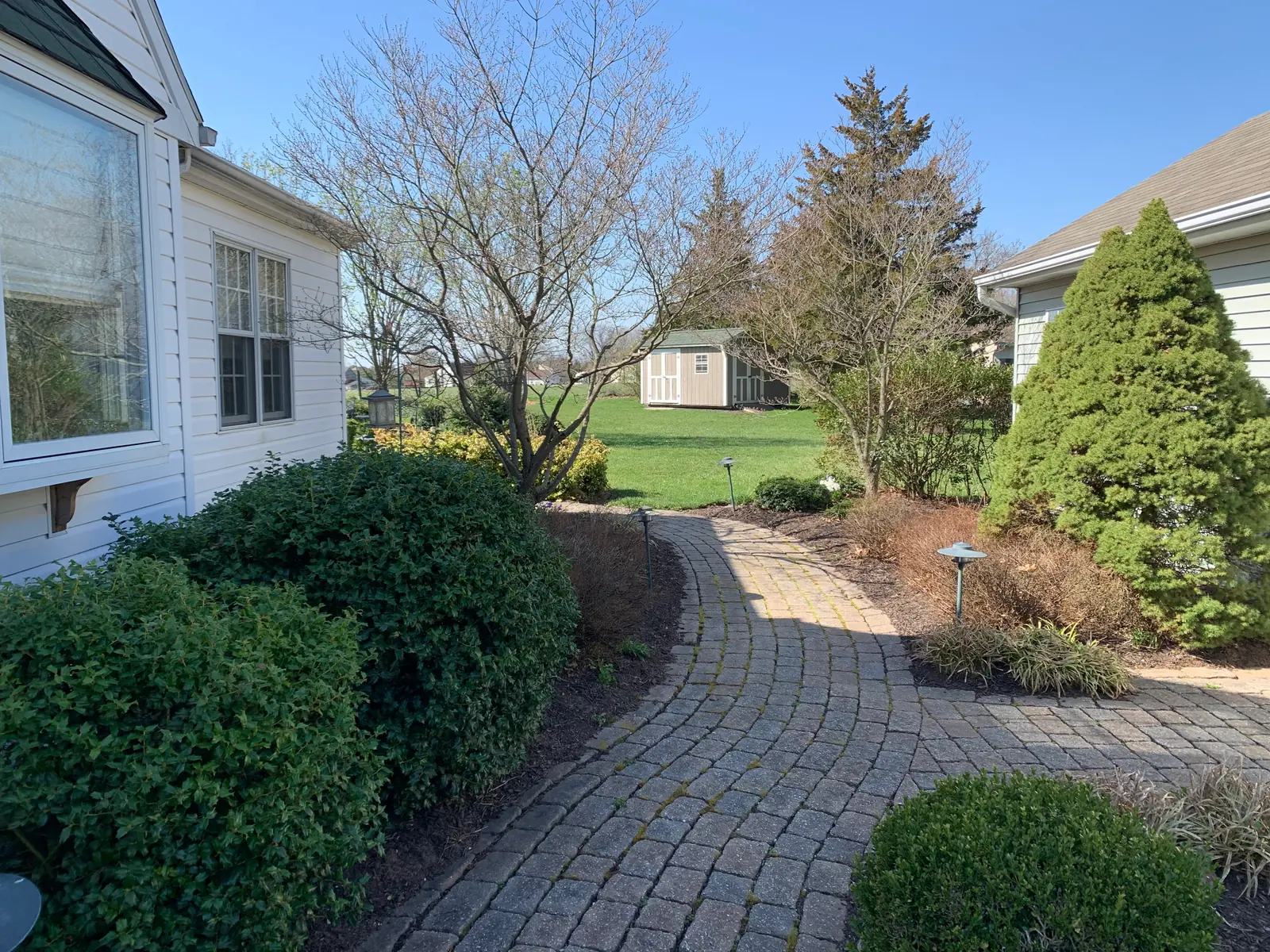 Existing paver walk and planting beds before renovation in Telford, PA