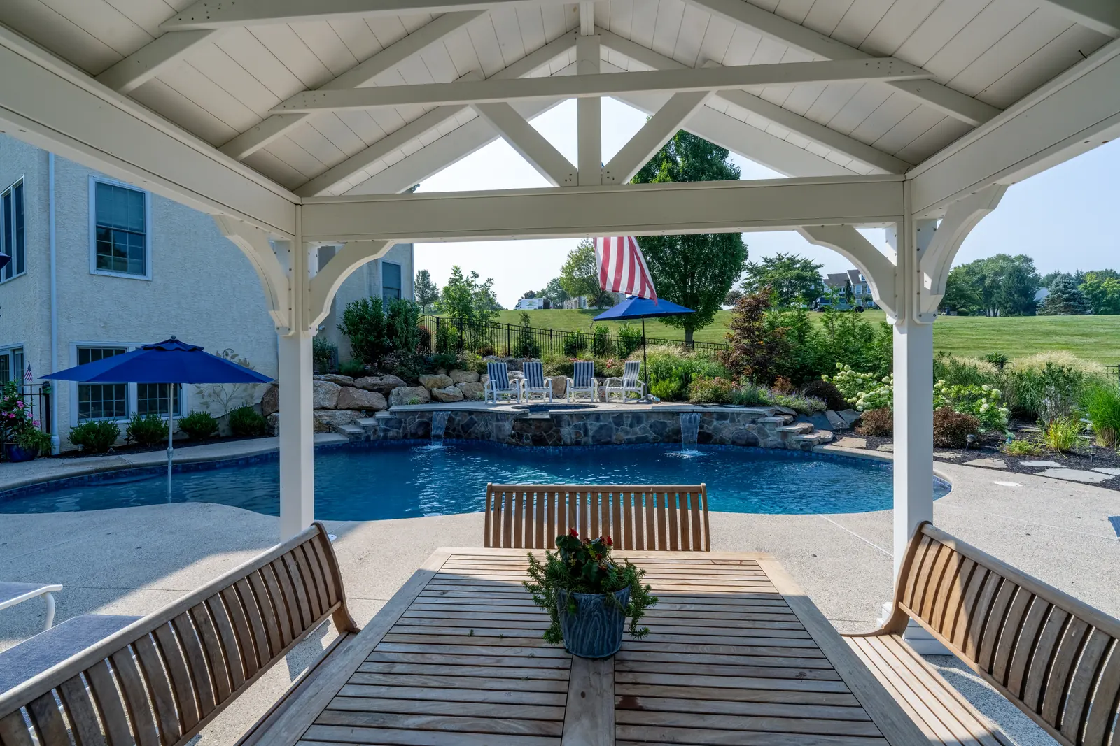 Custom pool viewed from a covered pavilion in West Chester, PA