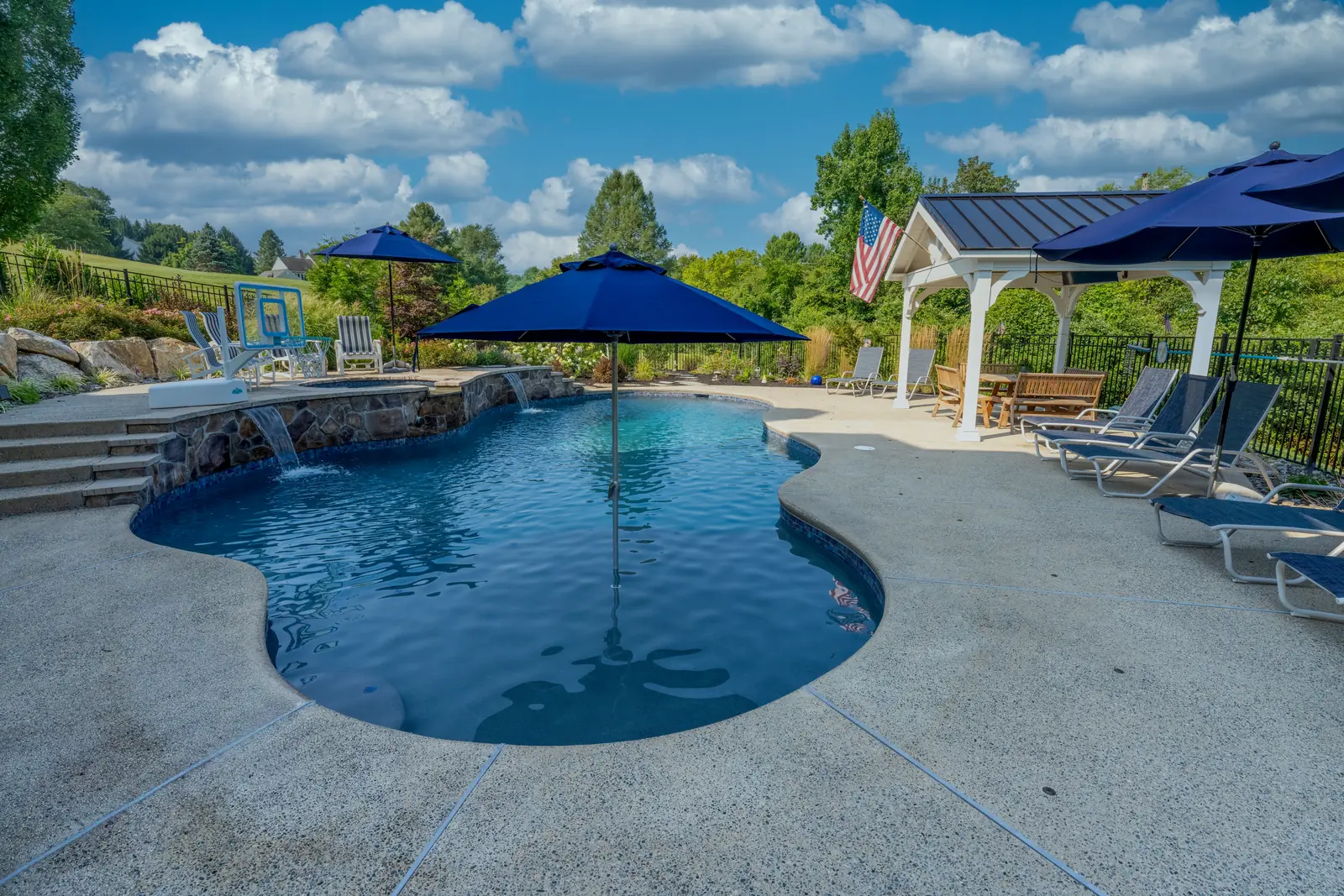 Finished custom pool, pavilion, and landscaping in West Chester, PA
